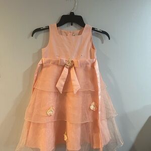 Youngland Girls size 6 peach dress with tie in back and see through overlay